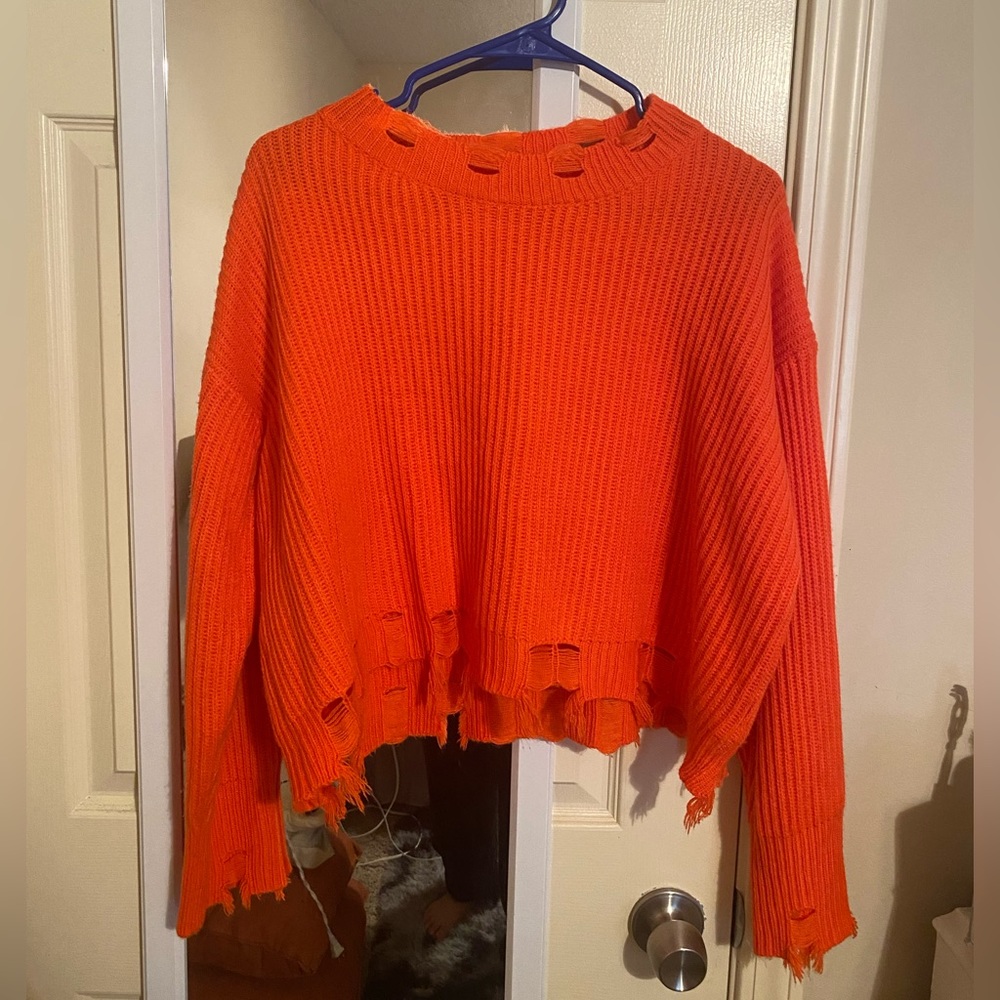 Distressed cropped sweater